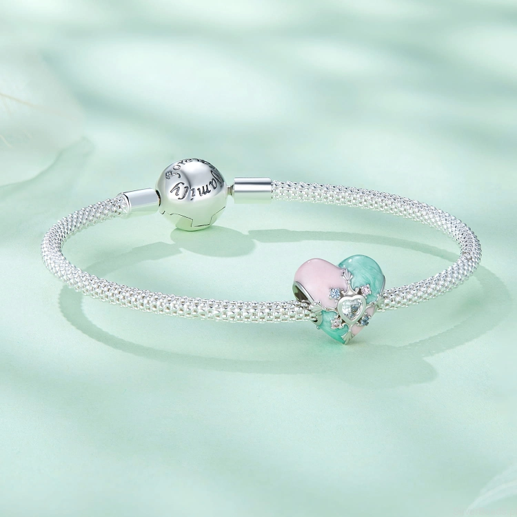 Srebrna bransoletka typu Pandora i charms serce Faberge G555