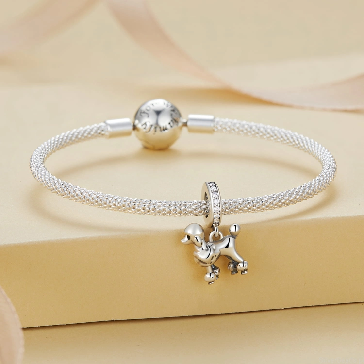 Srebrna bransoletka modułowa typu Pandora i charms pudel G567