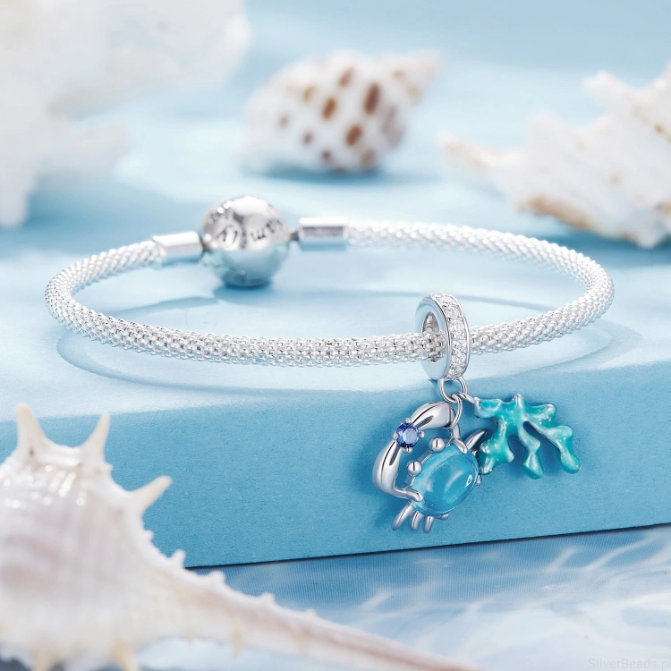 Srebrna bransoletka modułowa typu Pandora i charms Koral i krab G627