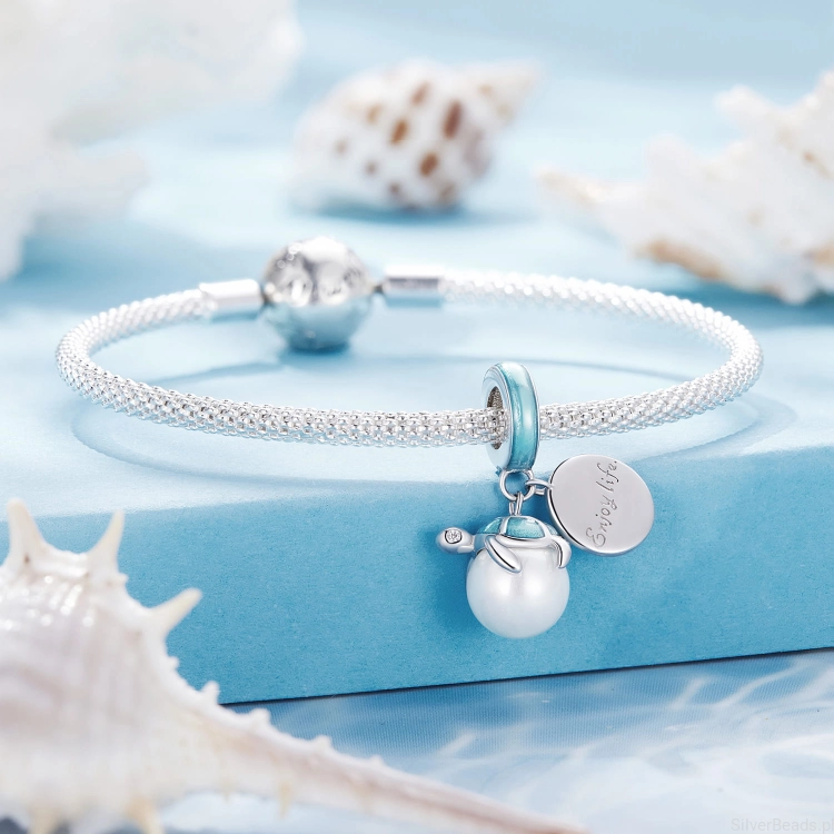 Srebrna bransoletka modułowa typu Pandora i charms Żółw z perłą G629