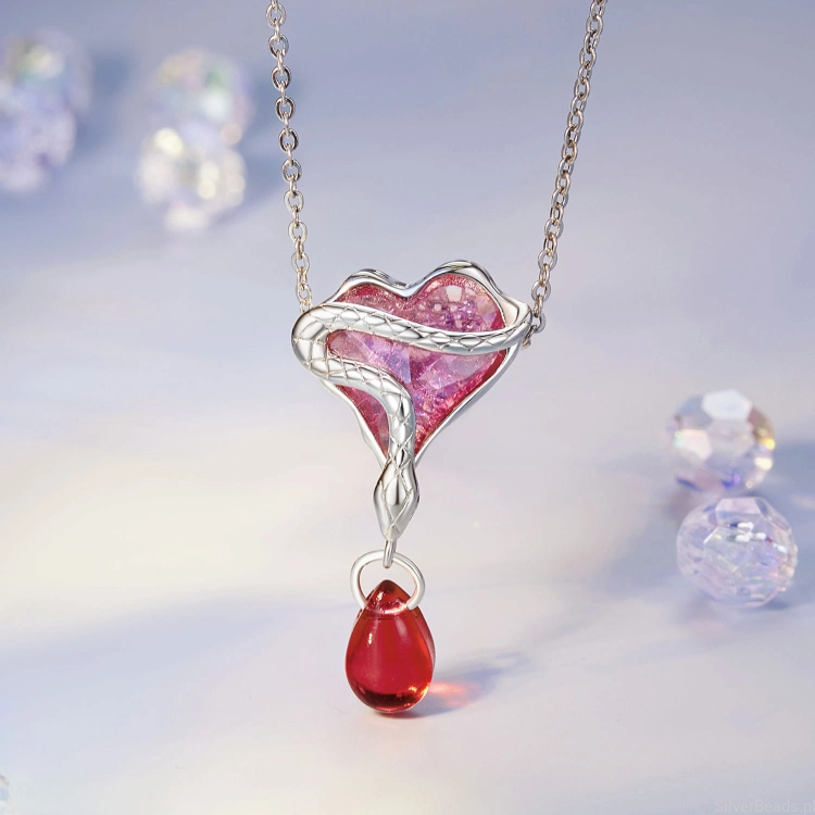 Charms srebro 925 Kryształowe serce z różą i wężem ozdobione wiszącym kryształkiem koralik do bransoletki modułowej charms