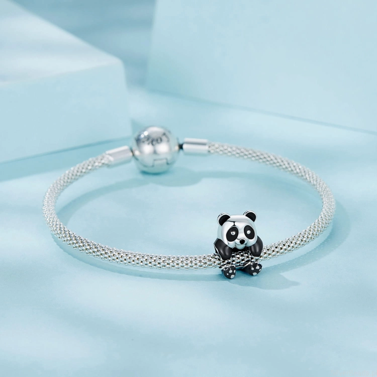 Srebrna modułowa bransoletka typu Pandora i charms mała panda