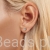delikatne srebrne kolczyki kamieniami moissanit