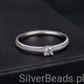 delikatny pierścionek  z Moissanitem 0,1 ct i brokatem