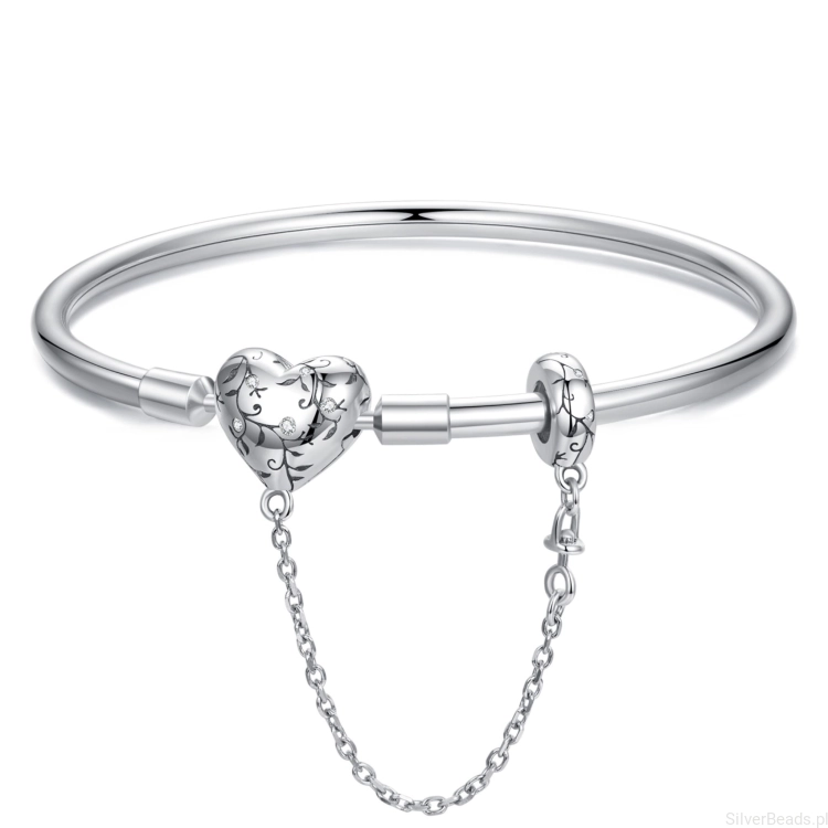 Srebrna sztywna bransoletka modułowa serce w roślinny ornament z łańcuszkiem zabezpieczającym 17 cm charms