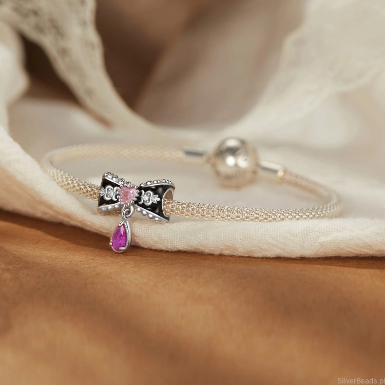 Charms ze srebra próby 925 kokardka z wiszącym kryształkiem