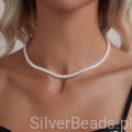 piękny srebrny naszyjnik z małymi perłami