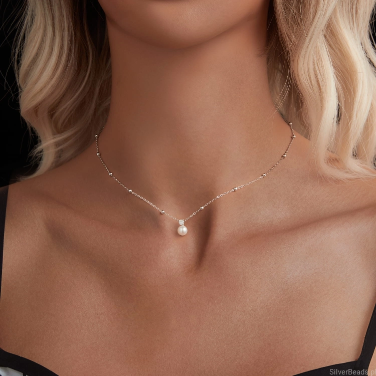srebrny naszyjnik perła i Moissanit 0,1 ct
