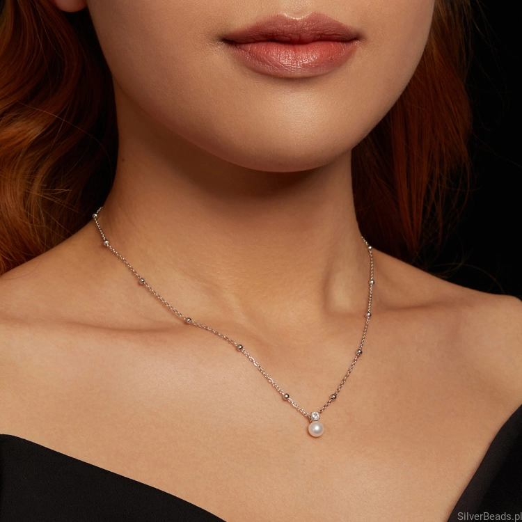 elegancki srebrny naszyjnik perła i Moissanit 0,1 ct