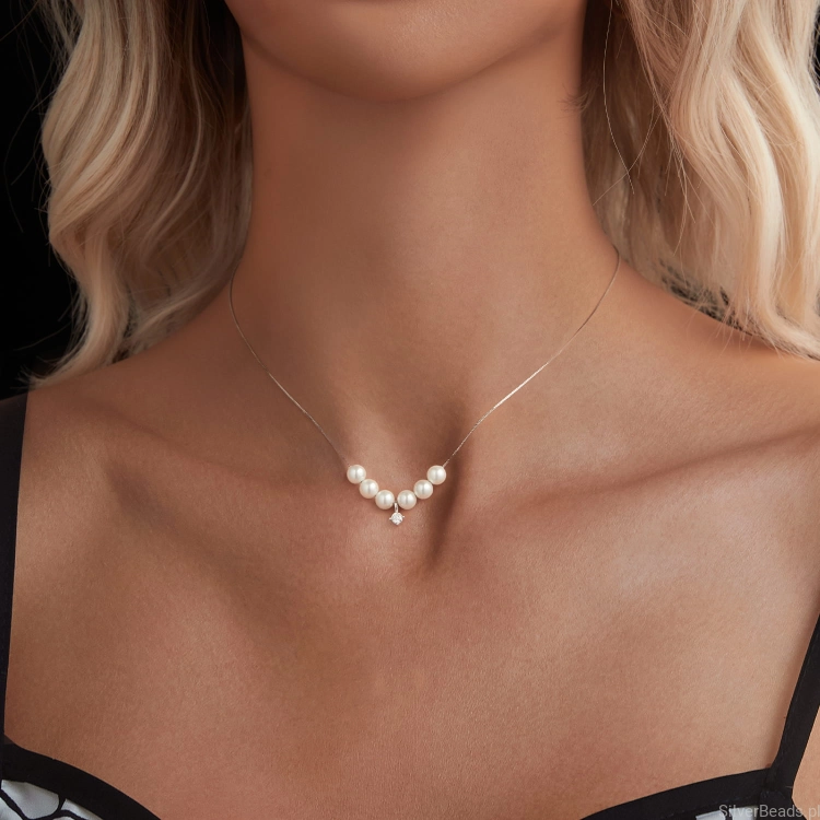 srebrny nasyzjnik z perłami i Moissanitem 0,1 ct