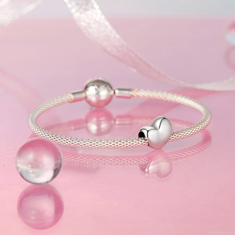Charms ze srebra próby 925 asymetryczne serduszko