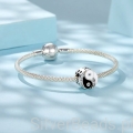 srebrny charms próba 925 kryształowe dwie połówki Yin Yang