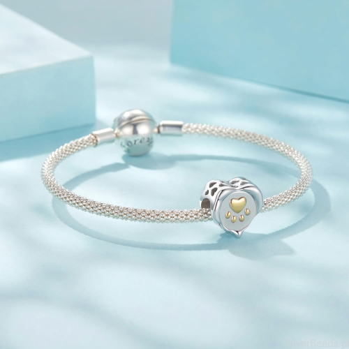 Charms ze srebra próby 925 serce z pozłacaną łapką