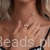 delikatny pierścionek ze srebra 925 z Moissanitem 0,1 ct i perłą
