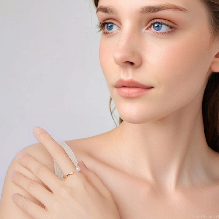 delikatny pierścionek ze srebra 925 pozłacany regulowany z Moissanitem 0,1 ct i perłą