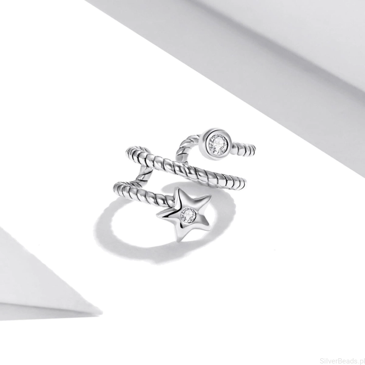 Kolczyk typu ear cuff ze srebra z gwiazdką – idealny do warstwowych stylizacji ucha.