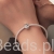 Detalicznie zdobiona sowa w birecie – elegancki charms.
