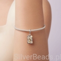 Astrologiczny charms Wodnik z błyszczącą gwiazdą.