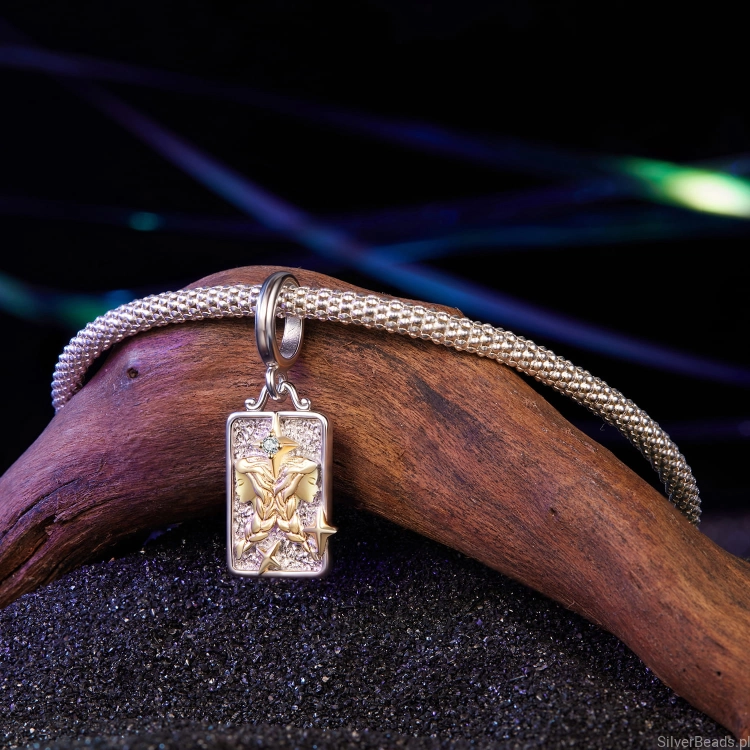 Astrologiczny charms bliźnięta dla osób ciekawych świata.