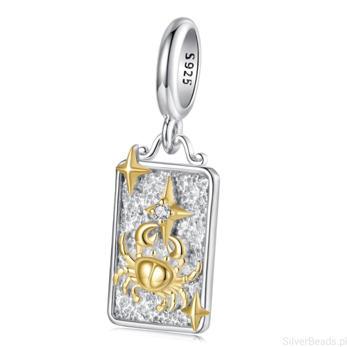 Srebrny charms rak ze złotym symbolem zodiaku.