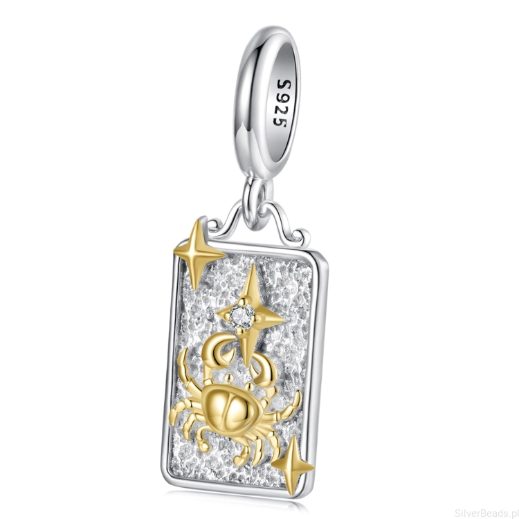 Srebrny charms rak ze złotym symbolem zodiaku.