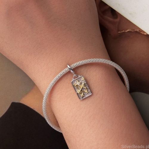 Srebrno-złoty charms strzelec dla miłośników astrologii.