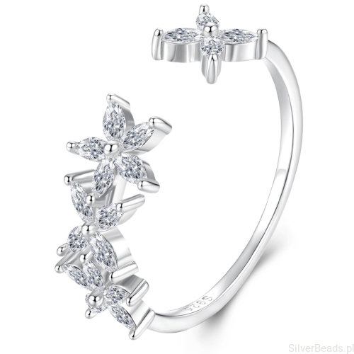 Srebrny pierścionek z kryształowymi kwiatami – delikatny i pełen blasku.