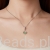 charms-zloty-z-perla-i-emaliowanymi-liscmi.jpg