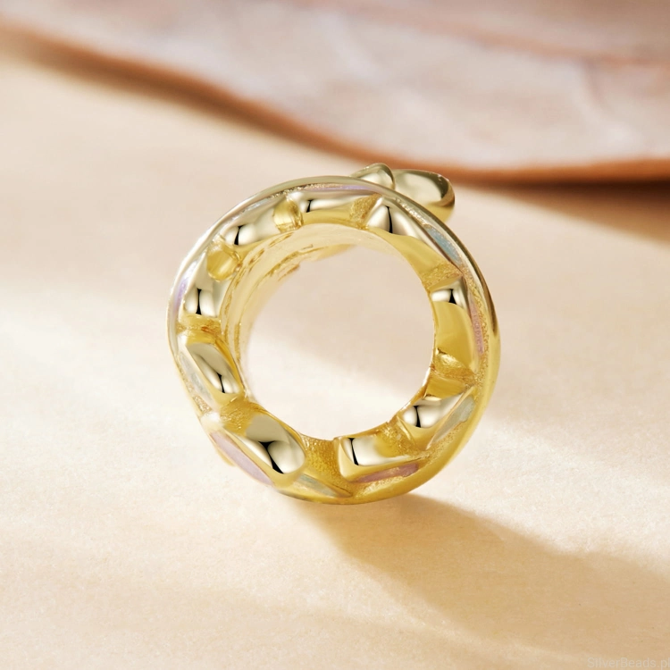 charms-pozlacany-lisc-z-emalia-pastelowa.jpg