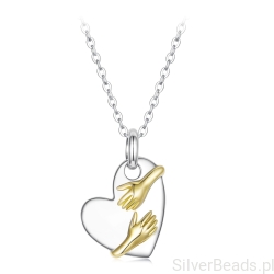 Srebrny naszyjnik serce z dłońmi – symbol troski i bliskości