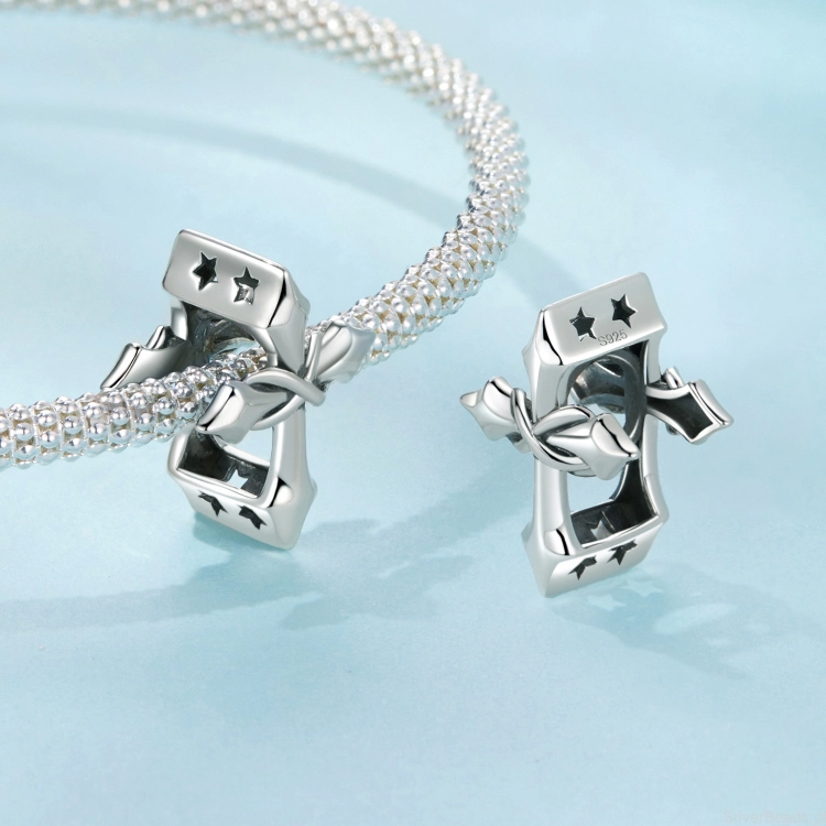 charms-krzyz-nieskonczonosc.jpg