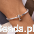 Srebrna bransoletka z uroczym pieskiem.png